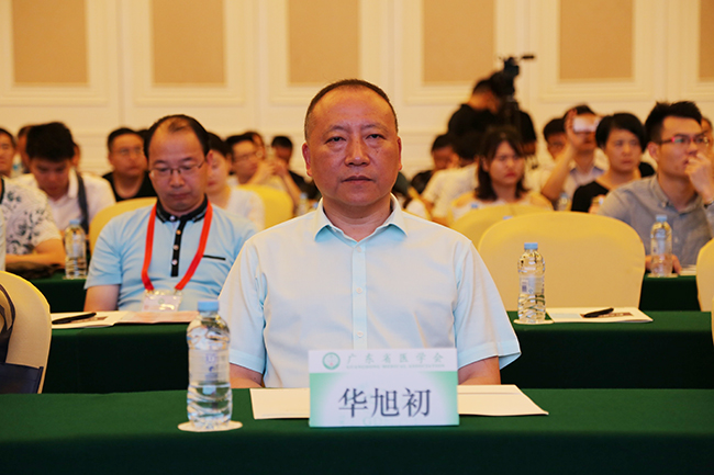 华旭初小图.jpg